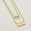 Gold double strand necklace with rose crystal accent and engraved Ringstone Symbol by Maconi Jewelry