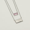 Silver double strand necklace with rose crystal accent and engraved Ringstone Symbol by Maconi Jewelry