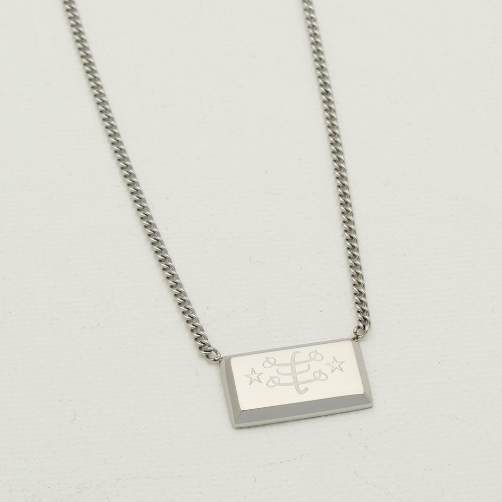 Minimal rectangle necklace in silver stainless steel with engraved Ringstone Symbol by Maconi Jewelry