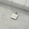 Square stainless steel necklace in silver with engraved Ringstone Symbol pendant by Maconi Jewelry
