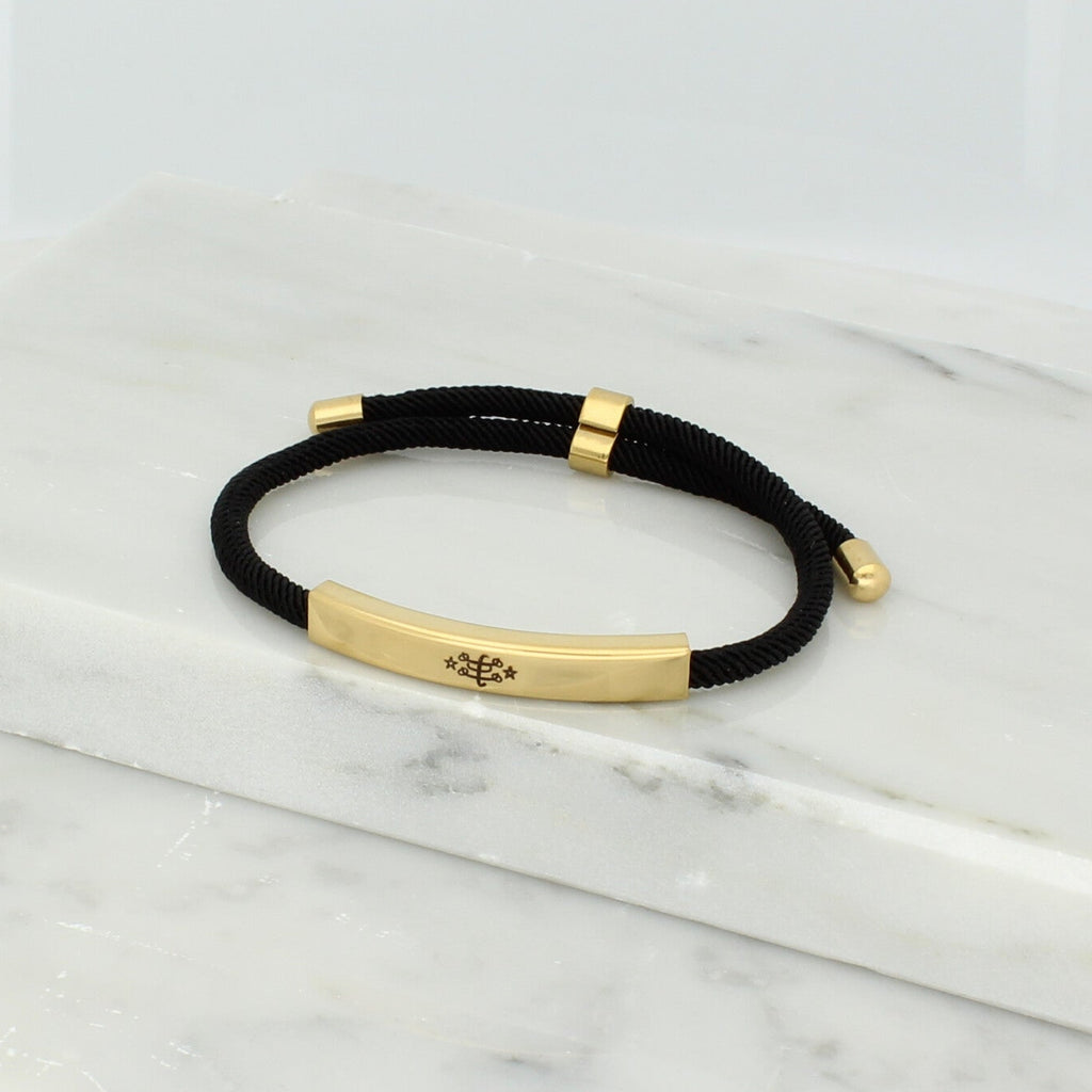 Adjustable silver bracelet with black nylon cord and engraved Ringstone Symbol by Maconi Jewelry