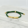 Adjustable gold bracelet with green nylon cord and engraved Ringstone Symbol by Maconi Jewelry