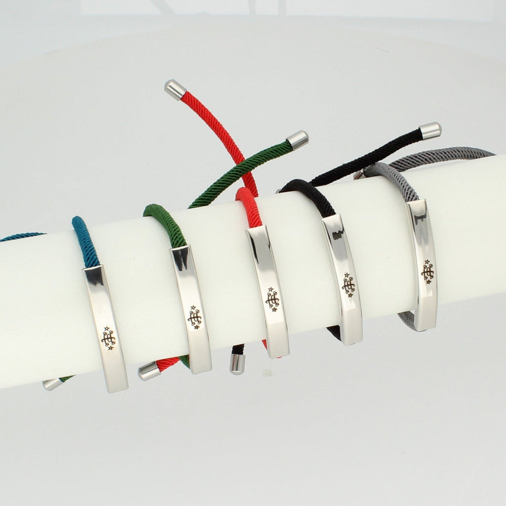 Adjustable silver bracelet collection with engraved Ringstone Symbol and colorful nylon cords by Maconi Jewelry