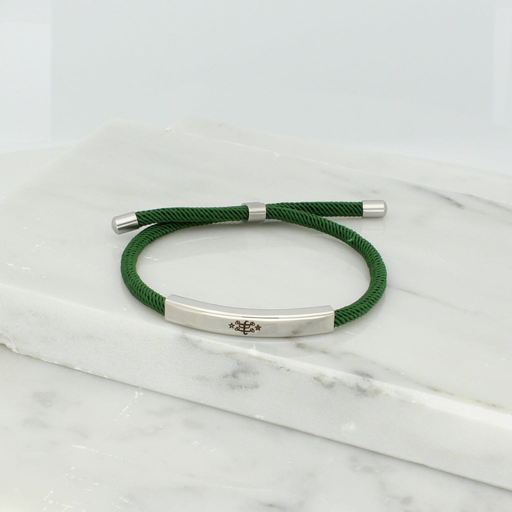 Adjustable silver bracelet with green nylon cord and engraved Ringstone Symbol by Maconi Jewelry