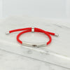 Adjustable silver bracelet with red nylon cord and engraved Ringstone Symbol by Maconi Jewelry