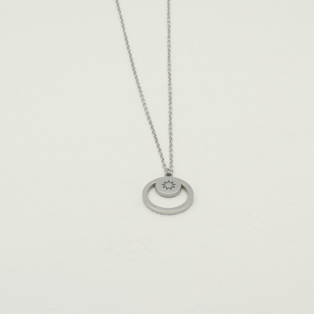 Minimal silver necklace with engraved 9-pointed star symbol by Maconi Jewelry