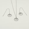 Minimal silver necklace and matching earrings with egraved 9-pointed star pendant by Maconi Jewelry