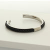 Open silver bangle with black braided leather and engraved Ringstone Symbol by Maconi Jewelry