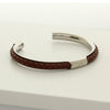 Open silver bangle with brown braided leather and engraved Ringstone Symbol by Maconi Jewelry