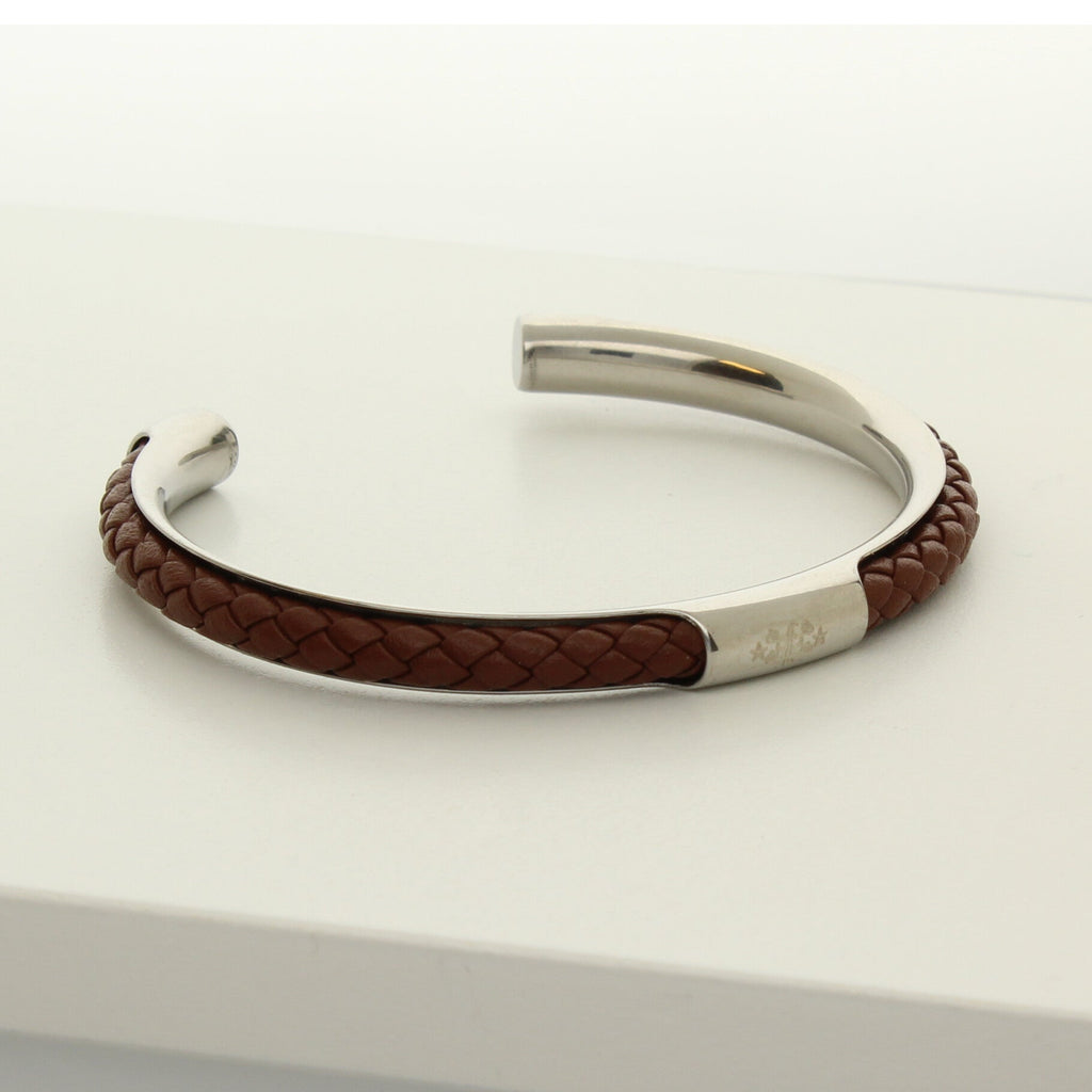 Open silver bangle with brown braided leather and engraved Ringstone Symbol by Maconi Jewelry